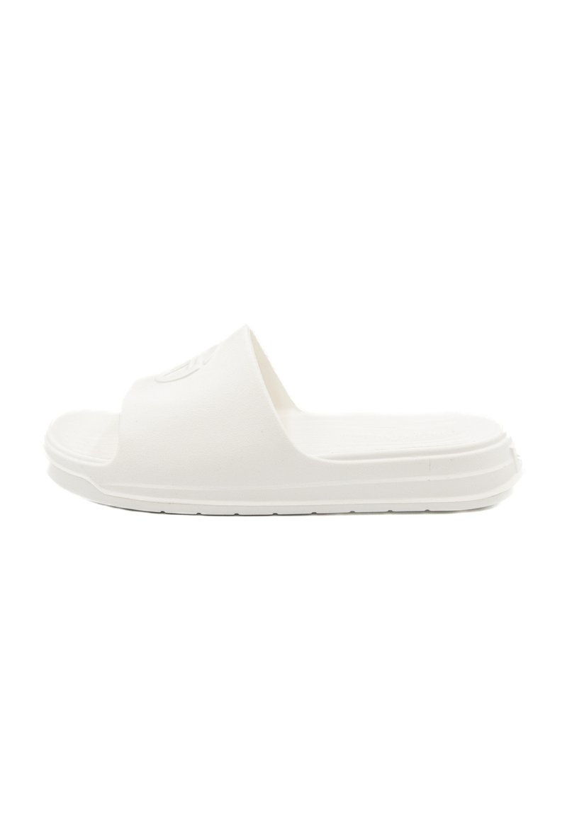 White slide sandal with a textured surface, open toe, and flat sole. Features a subtle logo on the strap and a smooth finish.