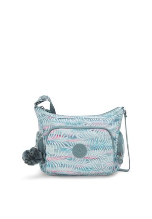 Crossbody bag with a light blue fabric, featuring a leaf pattern in pink and green. Includes a decorative gorilla keychain and multiple zippers.