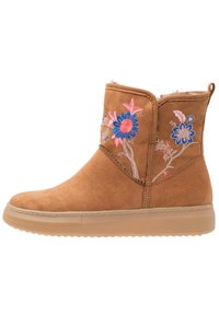 Tansuju ankle bootit, joissa on pinkki- ja sinikukallinen brodeeraus, pehmeä tekoturkisvuori, kumipohja ja helposti jalkaan pujotettavissa oleva muoto.