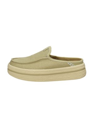 Scarpa mule beige slip-on con tomaia in tessuto strutturato e suola spessa in gomma con dettagli a motivo intrecciato.