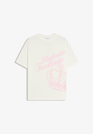 White short-sleeve T-shirt with light pink script reading "Unlimited Feelings" and a pink crown graphic on the front.
