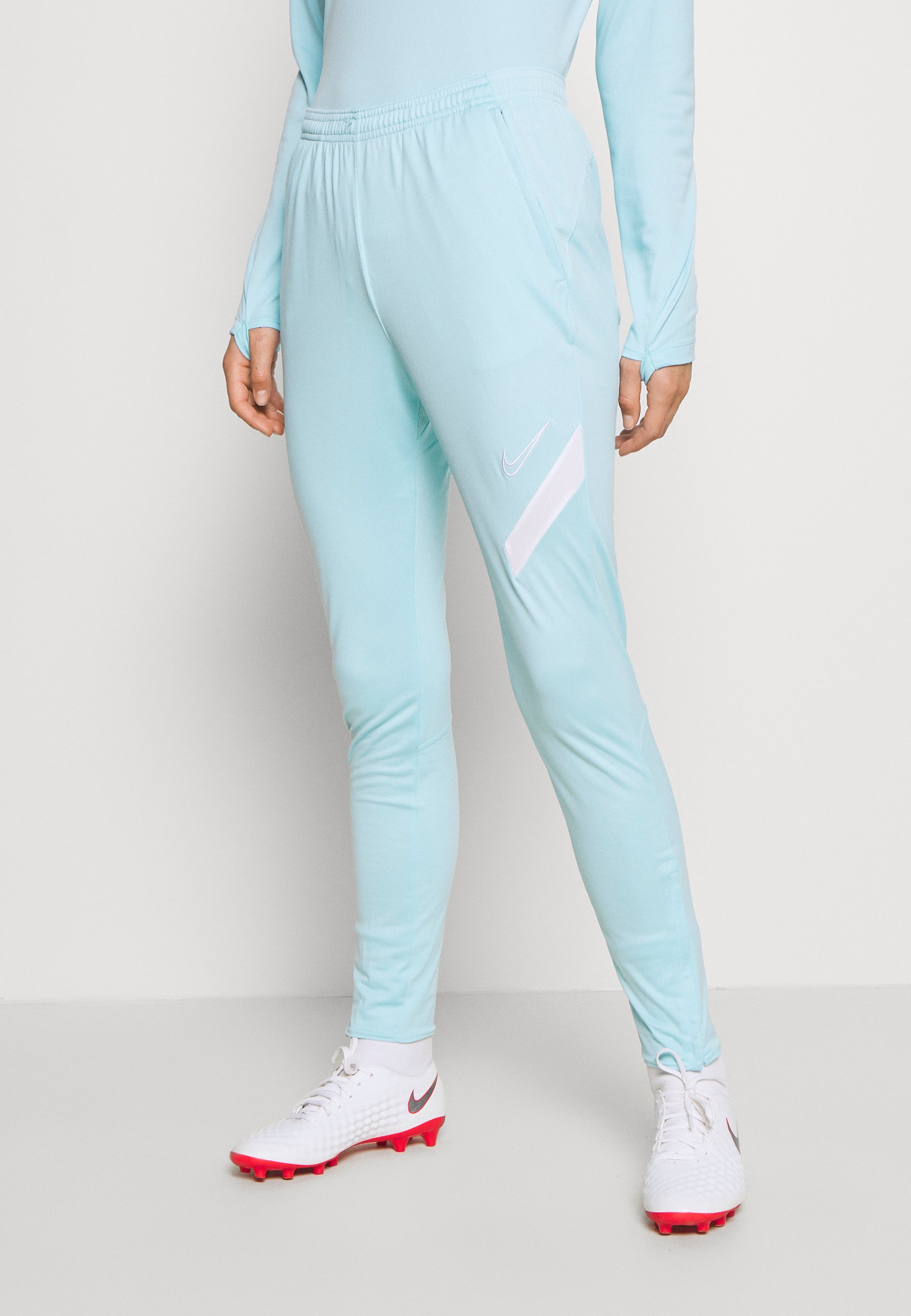 light blue nike tracksuit