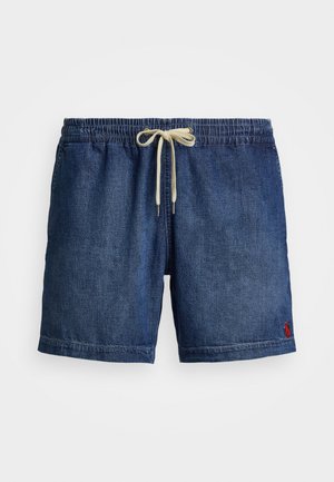Shorts de bain en denim bleu foncé avec une taille élastique, un cordon de serrage beige, des poches latérales et un petit logo rouge en bas de l'ourlet.