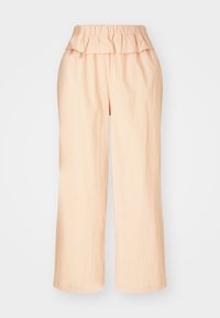 Pantalones de pierna ancha en color melocotón, con cintura elástica y borde superior con volantes. Fabricados con un tejido ligero, presentan una textura suave.
