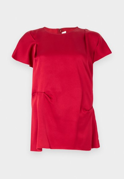 Red short-sleeve top with a round neck, featuring a back zip closure and a gathered detail at the side for added texture.