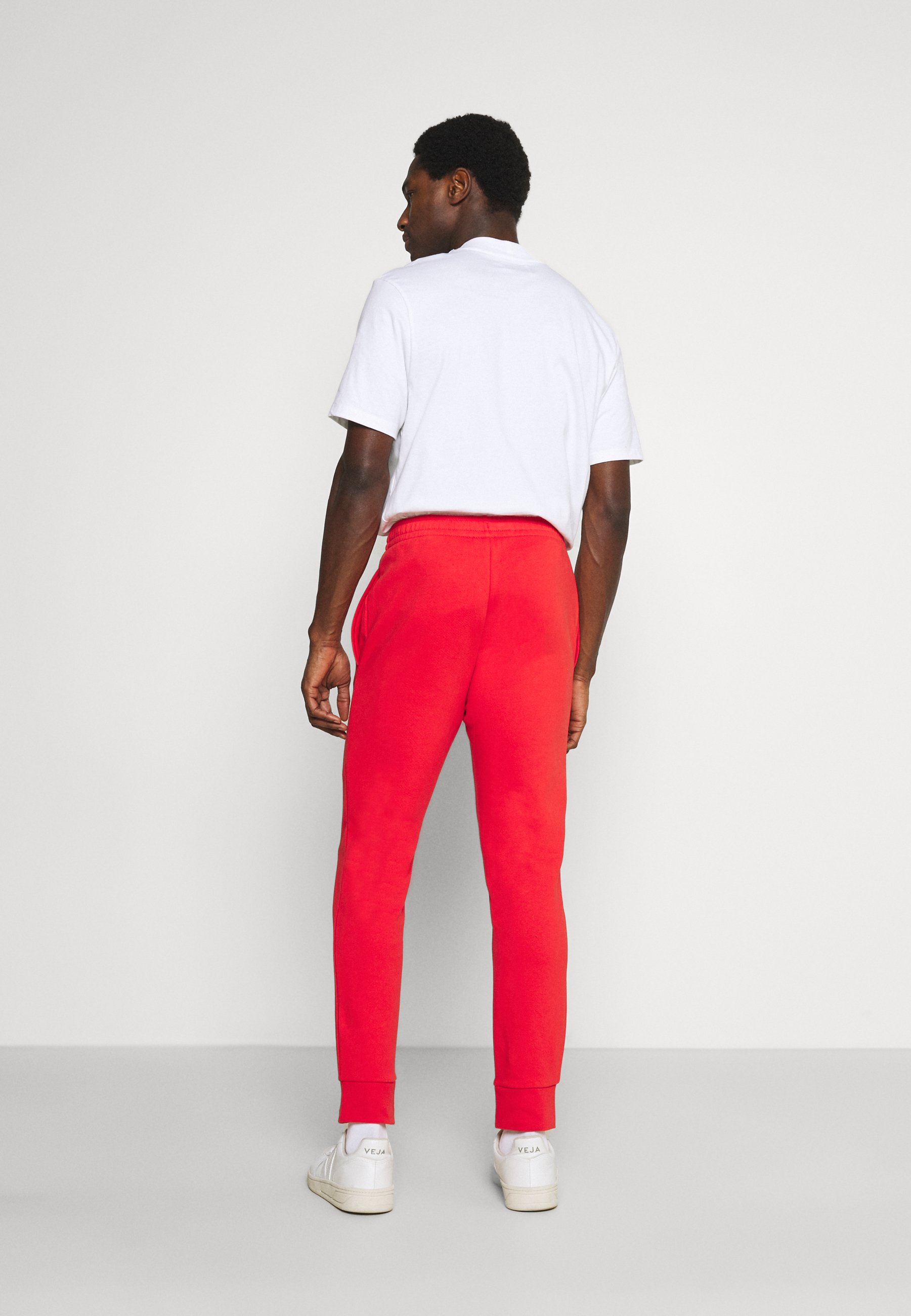 Lacoste Tracksuit bottoms - redcurrant 
