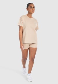 Smilodox FAYNE PRO - Pantaloncini sportivi - creme