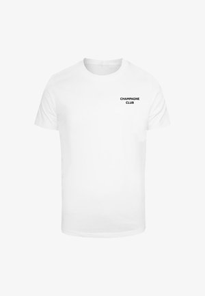 Valge puuvillane t-särk lühikeste varrukatega, millel on must tekst "CHAMPAGNE CLUB" vasakul rinnapiiril. Klassikaline ümmargune kaelus.