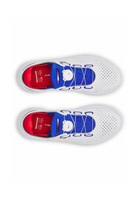 White athletic shoes with a perforated upper, blue and red accents, and a dial lacing system. Red insoles and sleek design features are visible.