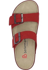 Red suede slide sandal with two adjustable straps and metallic buckles. Cushioned tan insole with brand logo printed on it. Flat sole.