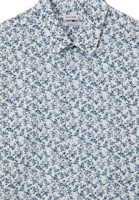 Camicia bianca con motivo floreale blu, vestibilità regolare, taglia large, marca Calliope.