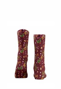Calzini bordeaux con un motivo festivo che presenta foglie di agrifoglio, bastoncini di zucchero, stelle e punti bianchi su una trama morbida. Design a altezza caviglia.