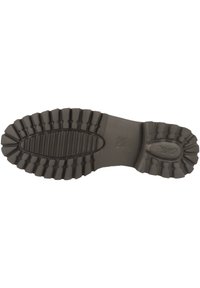 Schwarze Gummisohle mit tiefen Profil, versehen mit einem ovalen Design in der Mitte und "High Soft" seitlich eingraviert.