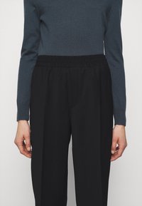 Filippa K Tygbyxor - black