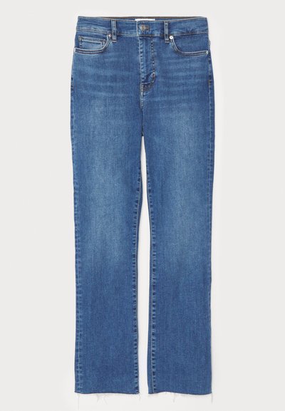 Blue denim jeans with a straight cut, featuring a button and zip closure, five pockets, and frayed hemlines at the bottom.