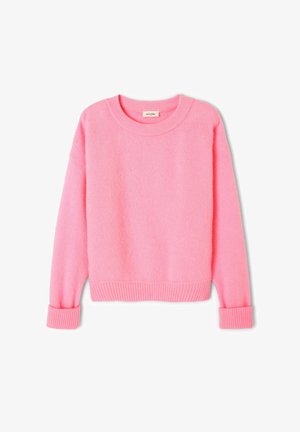 Rozā, mīksts džemperis ar apaļu izgriezumu, ribotām piedurknēm un apakšmalu. Audums izskatās pūkains, un dizains ir vienkāršs un klasiskas formas.