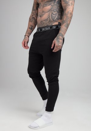 LOUNGE PANTS - Pantaloni del pigiama - black
