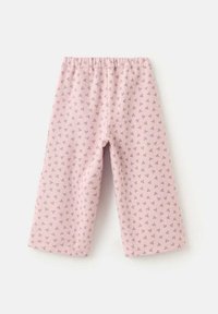 Ljusrosa bomullsbyxor med resår i midjan, med ett delikat blommönster i lila och grönt. Vid bendesign.