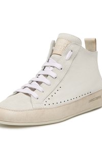High-top sneakers made of light beige suede, featuring white laces, perforated detailing, and a textured outsole with a brand logo.
