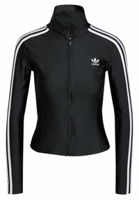 Svart zip-up jacka av slätt material, med vita tre ränder på ärmarna och en liten vit Adidas-logotyp på bröstet.