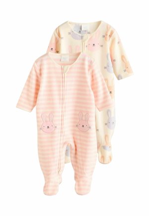 Deux grenouillères pour bébé : l'une rose avec des rayures blanches et une application de lapin, l'autre crème avec des imprimés de lapin. Les deux sont en tissu doux avec des zips.