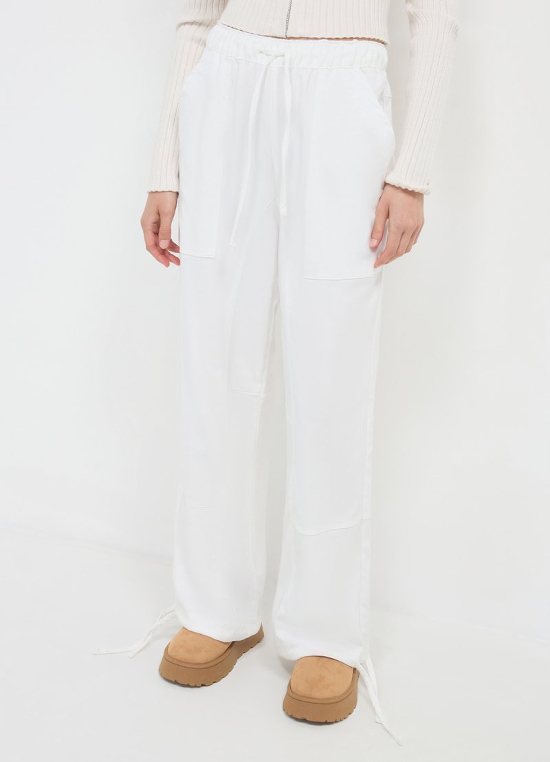 Calliope CON TASCONI - Pantalon classique - bianco