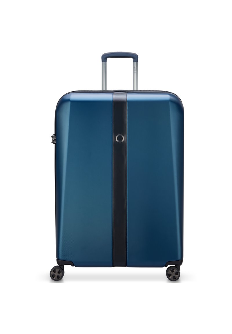 Valise rigide de couleur bleu marine avec une finition brillante, bandelette noire au centre, quatre roues et une poignée télescopique.