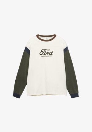 Camicia a maniche lunghe color crema con maniche verde e blu navy, con la scritta "Ford Dearborn, Michigan" in lettere verde scuro sul davanti.