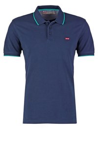 Polo bleu marine à manches courtes avec bordures vertes au col et aux manches, patte de boutonnage et petit logo rouge Levi's sur la poitrine.