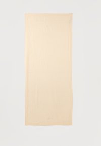 Écharpe rectangulaire beige avec un motif géométrique subtil, posée à plat sur un fond blanc.