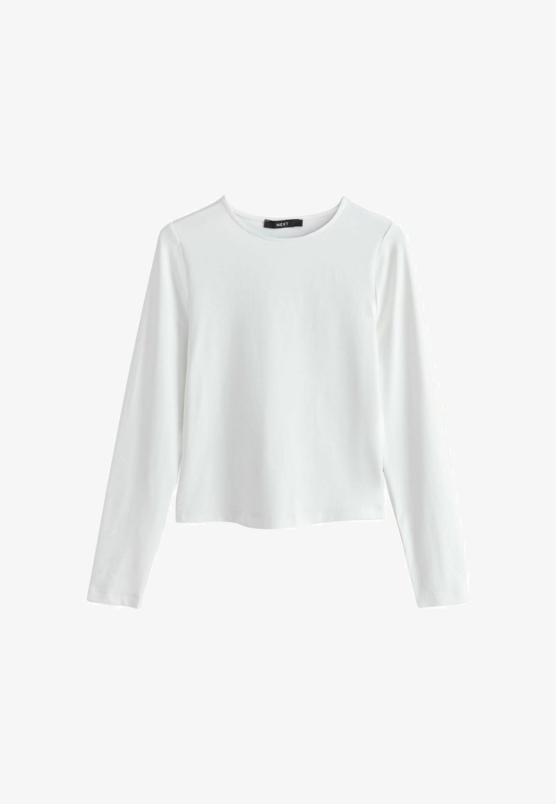 T-shirt blanc à manches longues avec col rond, ourlet droit et tissu lisse, présenté à plat sur fond blanc.