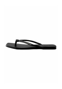 Tongs noires avec une semelle plate et des fines lanières. Les lanières s'entrelacent avec un détail noué au niveau de l'orteil. Texture lisse et mate.