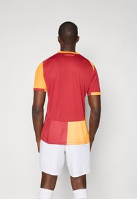 Puma GSK HOME REPLICA SPONSOR - Futbalový dres - red rhythm/intense orange