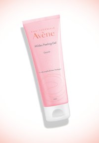 Pink tube of Avène Mild Peeling Gel for the face, featuring a smooth, soft texture and a white cap with a circular opening.