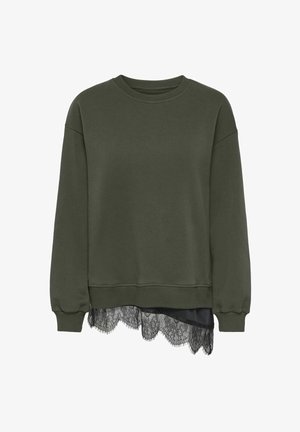 Mørkegrøn sweatshirt med lange ærmer med ribbet manchet og kant, med en sort blondekant, der titter frem fra nederkanten.