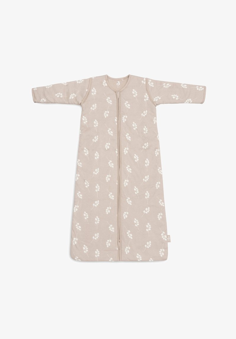 Sac de couchage beige clair avec motif floral blanc, fermeture éclair sur toute la longueur, manches longues et tissu doux pour le confort et la chaleur.