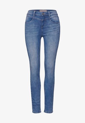 Slim jeans i ljusblå denim. Har fem fickor och dragkedjestängning med knapp. Slät textur, lätt blekt tvätt och skräddarsydd passform.