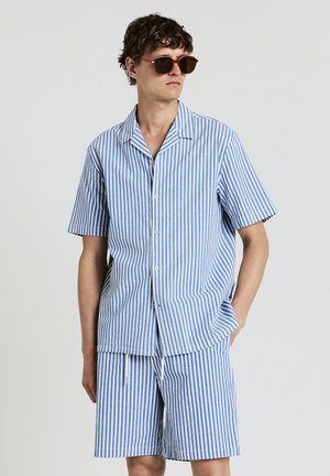 Striped blue and white short-sleeve shirt and matching shorts in a lightweight fabric, featuring a button closure and front pockets.