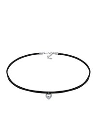 Black suede choker with a silver heart pendant. Features a clasp closure and adjustable length. Smooth texture and minimalist design.