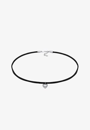 Must mustrist kaelakee hõbedase südame ripatsiga. Omab klambrist sulgemist ja reguleeritavat pikkust. Sile tekstuur ja minimalistlik disain.