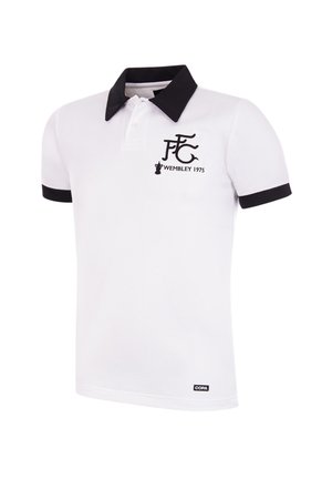 White polo shirt with black collar and sleeve accents. Features embroidered logo "FFC Wembley 1975" and a small "COPA" label at the hem.