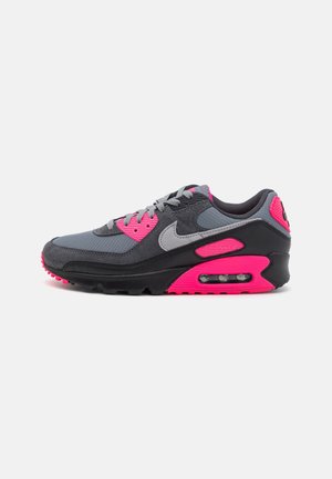 Gray and black Nike Air Max sneaker with bright pink accents and visible air sole unit, facing left on a white background.
