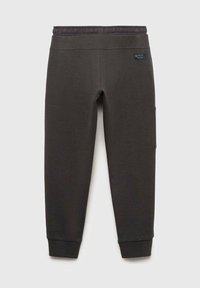 Mörkgråa sweatpants med en strukturerad yta, elastisk midja och muddar, med en sidoficka och en liten märkesetikett.