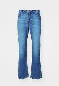 Ljusblå utsvängda jeans i denim. Har en knapplåsning och blixtlås, fem fickor och en något blekt tvätt.