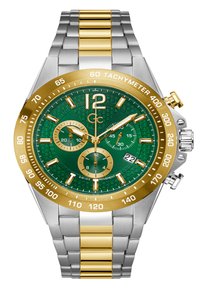 Reloj cronógrafo con un dial verde estampado, bisel dorado y pulsera de eslabones plateados con acentos dorados. Muestra tres subdiales y la fecha.