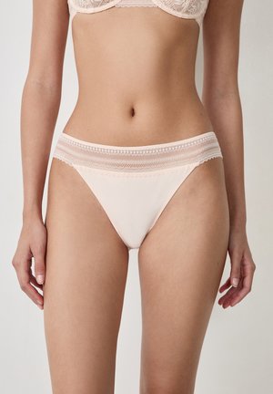 Light pink underwear with a smooth fabric, featuring a lace band at the waist and delicate trim along the edges.