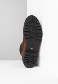 NeroGiardini Tronchetti - cuoio