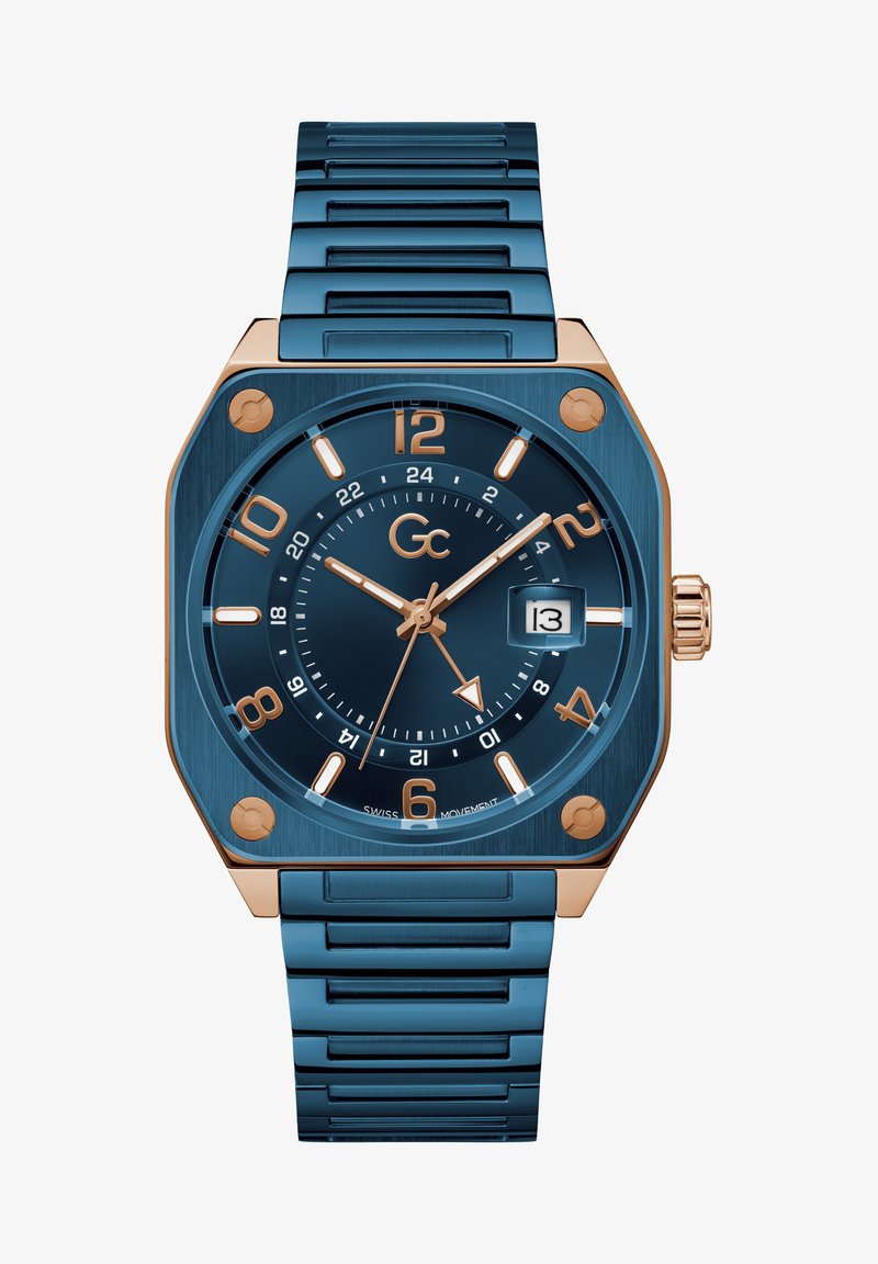 Reloj de acero inoxidable azul con caja octagonal, acentos en oro rosa y un dial texturizado. Las características incluyen una ventana de fecha y números en negrita.