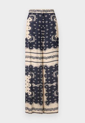 Long, wide trousers in navy blue with cream paisley pattern; features a banded waist and decorative buttons down the front. Smooth fabric texture.