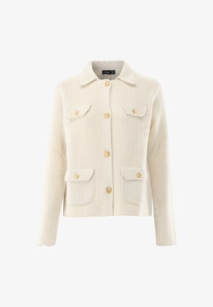 Cream textured jacket with a collared neck, front pockets, and gold buttons. Features a woven pattern and a cropped design.